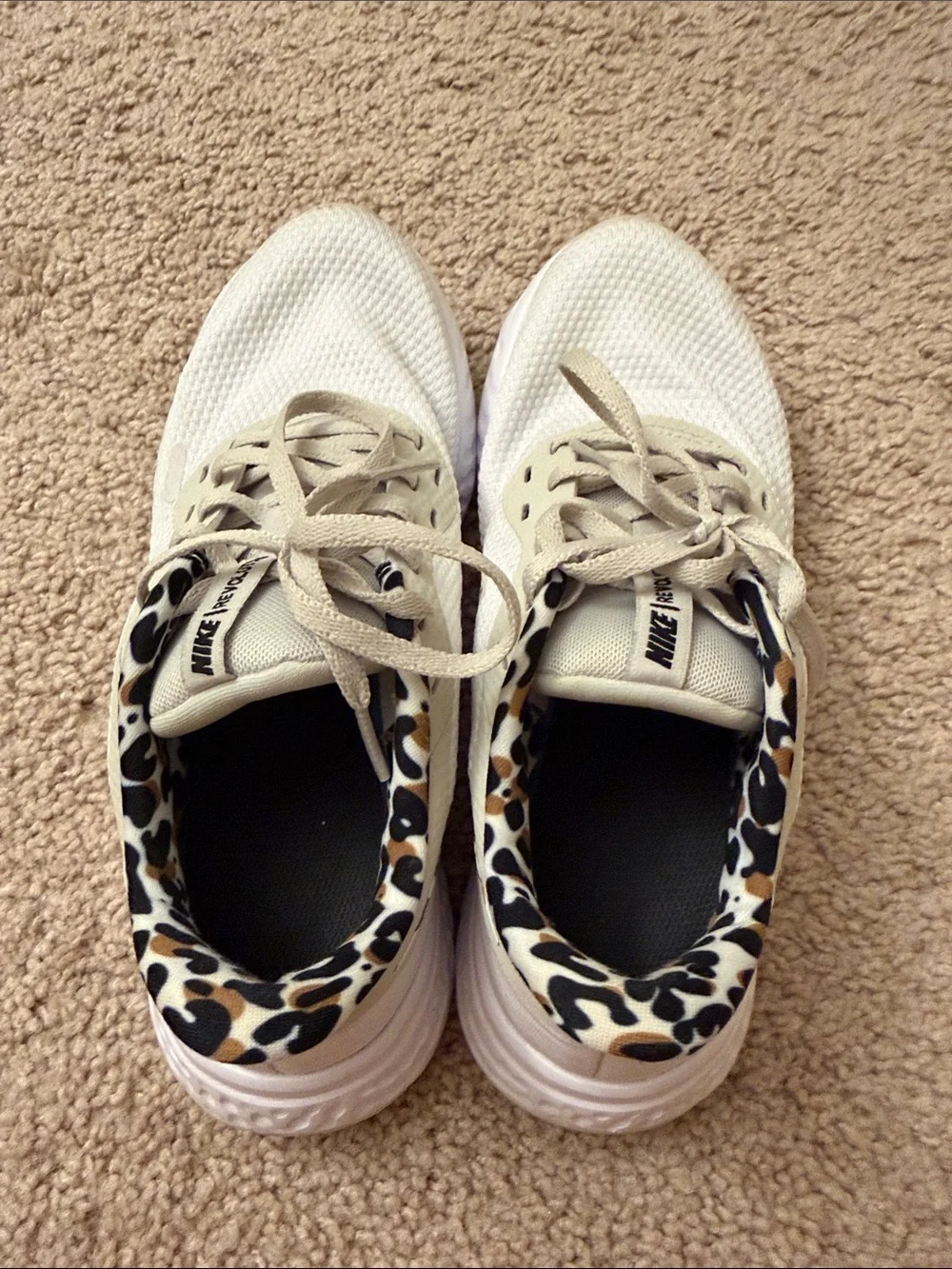 Nike Women's White Athletic Shoes with Leopard Accent